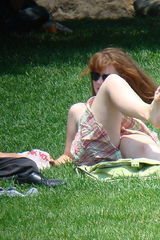 Up skirt girls - redhead teenie on a lawn